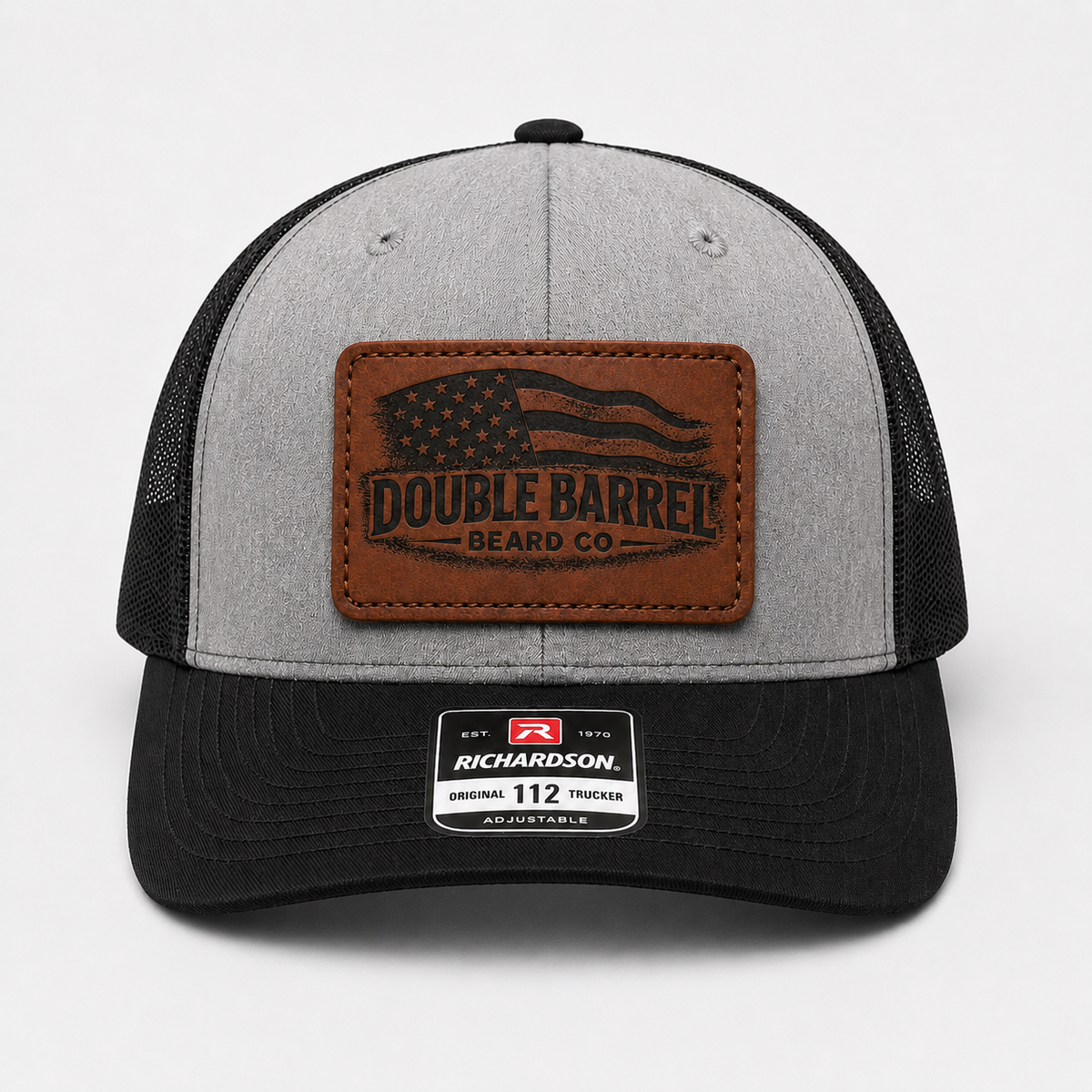 DOUBLE BARREL LEATHER PATCH TRUCKER HAT