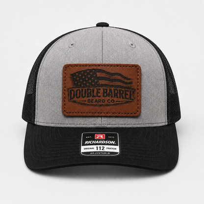 DOUBLE BARREL LEATHER PATCH TRUCKER HAT